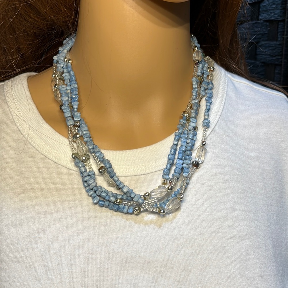 Multi strand blue stones and clear beads